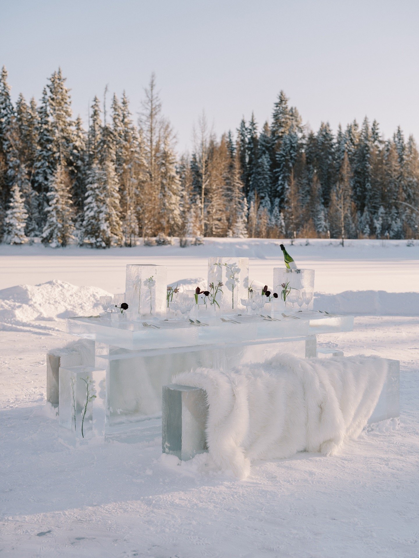 Full ice table and benches set outdoors at Archway Manor