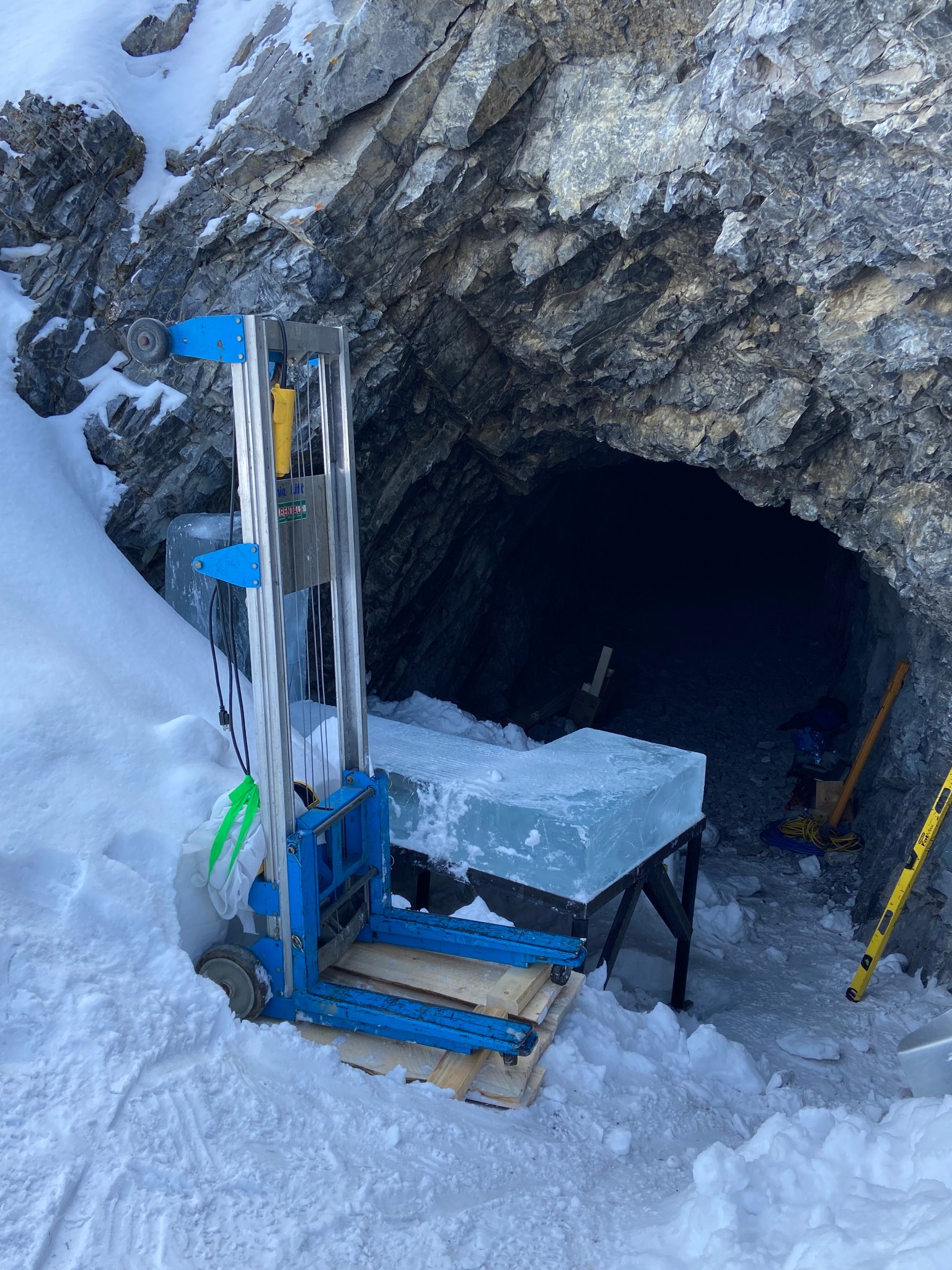 Cave entrance — bare rock before the ice wall build
