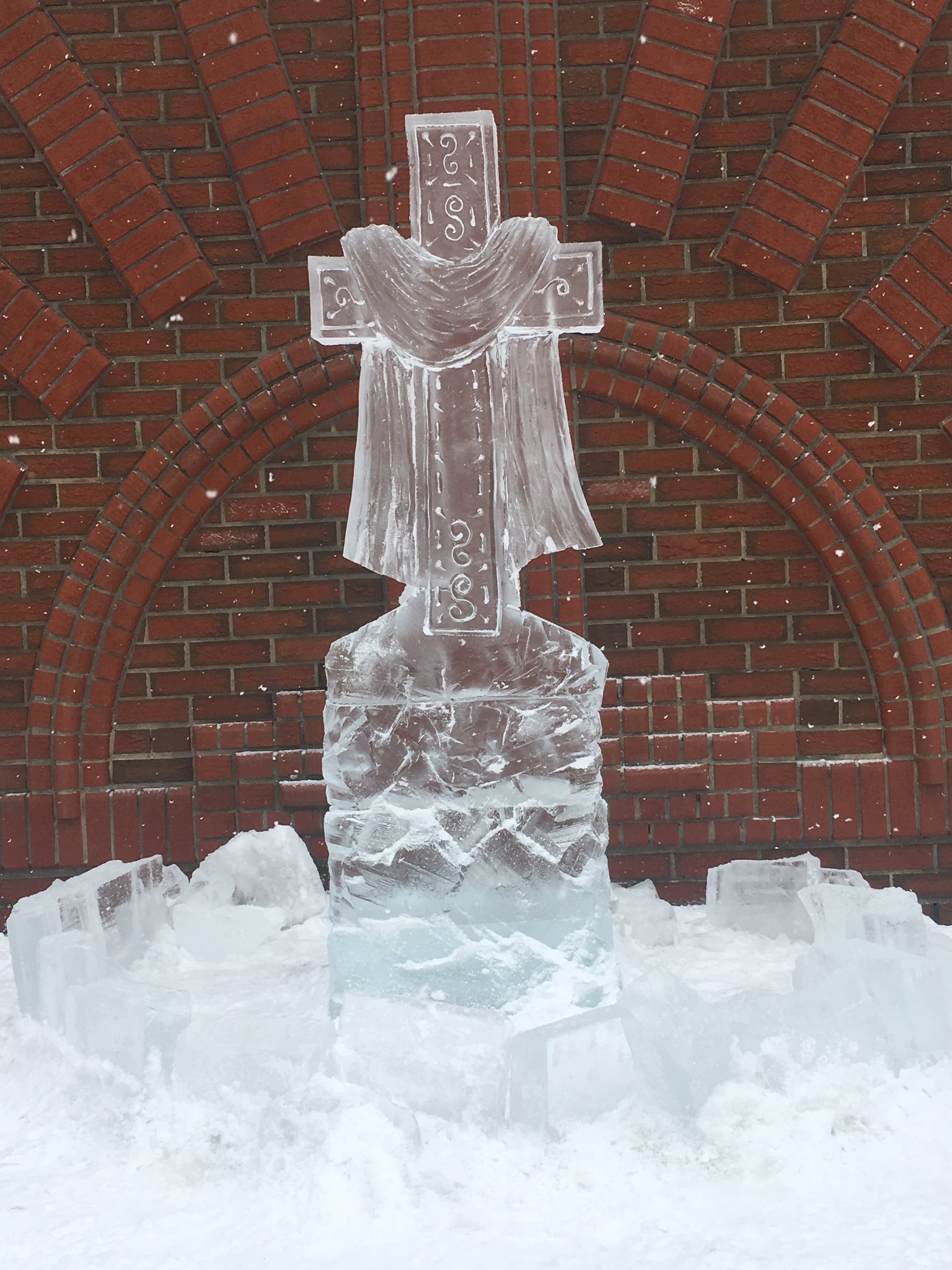 Draped cross ice sculpture