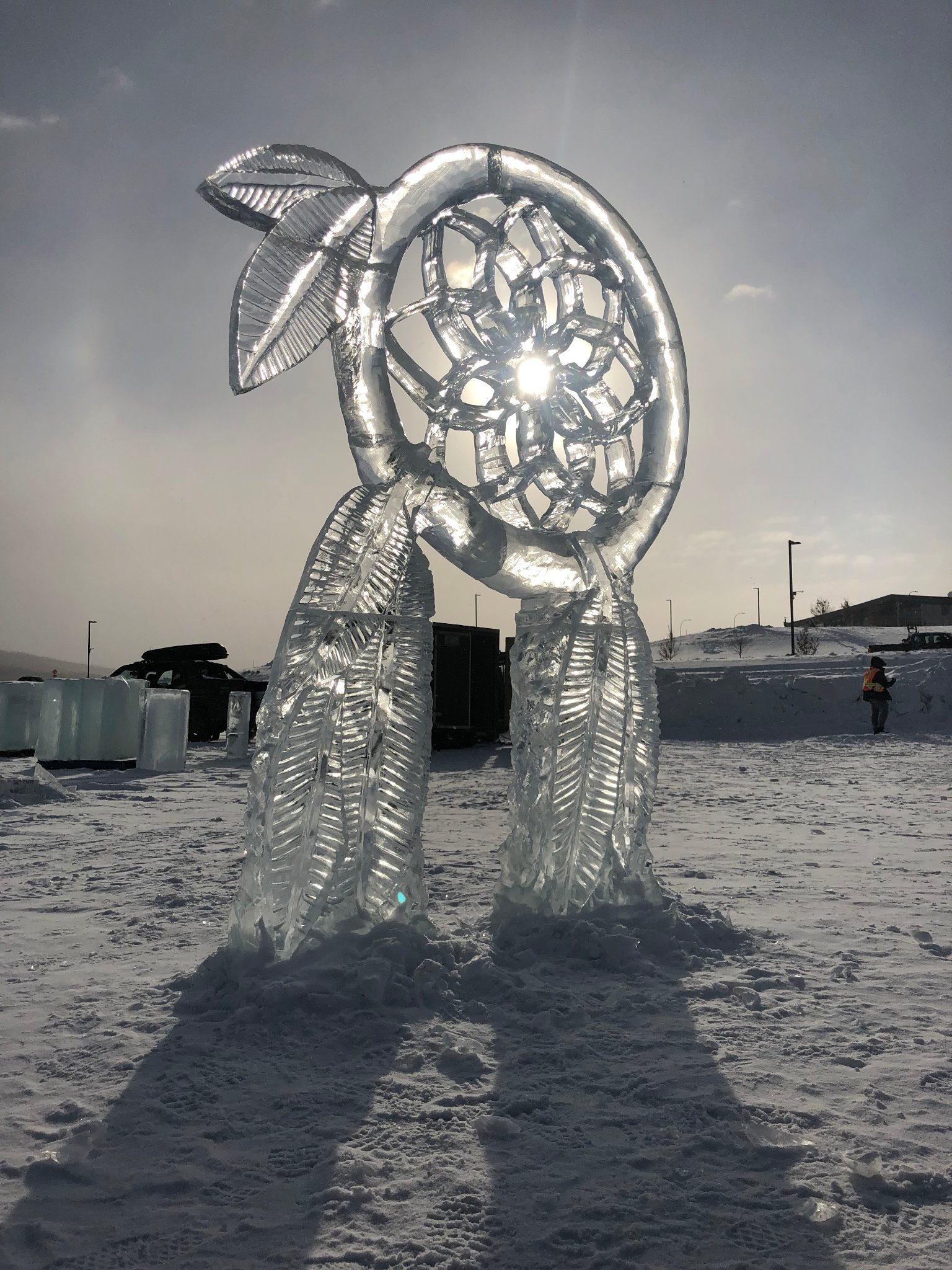 Dreamcatcher ice sculpture in sunlight