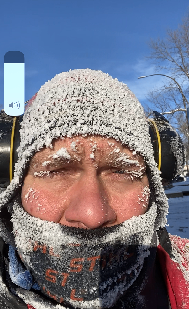 Frosted face selfie of ice sculptor