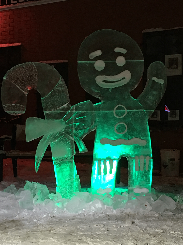 Gingerbread man ice sculpture at night