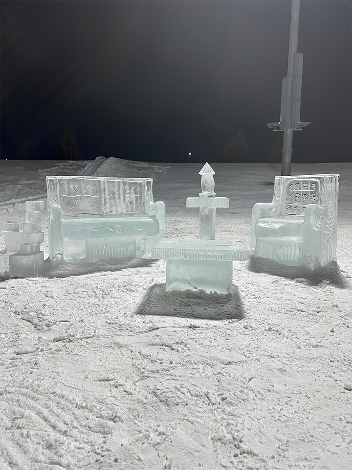 Ice loveseat and chair at a festival