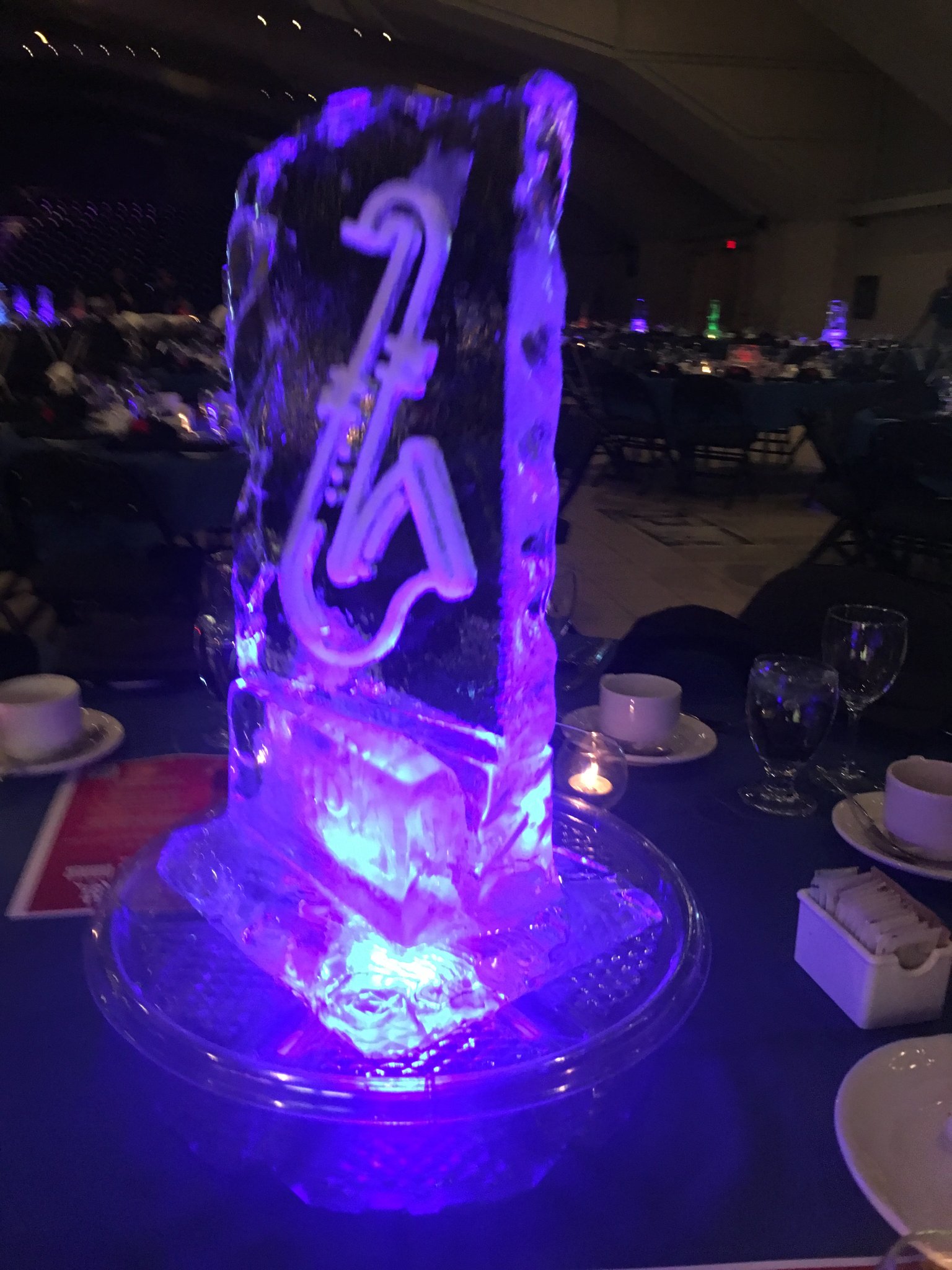 Musical centrepiece ice sculptures in ballroom
